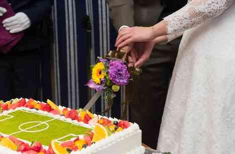 2人の共通テーマをオリジナルで叶えた結婚式の披露宴画像